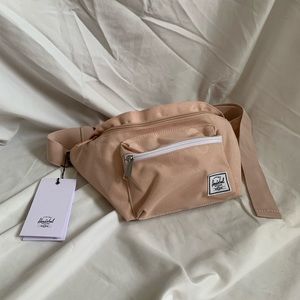 Herschel pink polk a dot hip pack